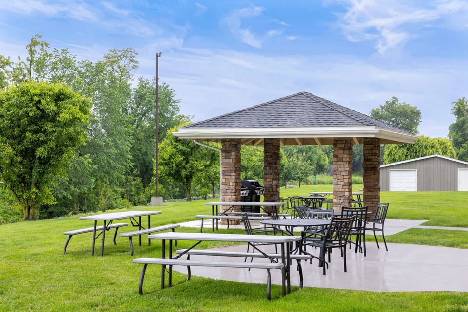 Relaxing outdoor patio area with seating for alfresco dining.