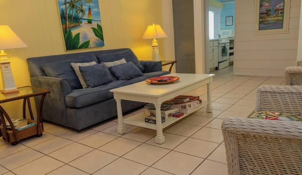 House, Multiple Beds, Patio, Garden View | Living area | 40-inch TV with digital channels