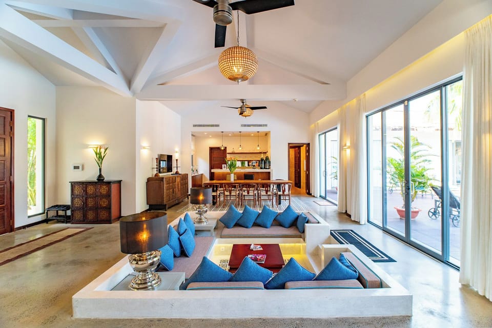 Presidential Villa | Living area | 21-inch TV with cable channels