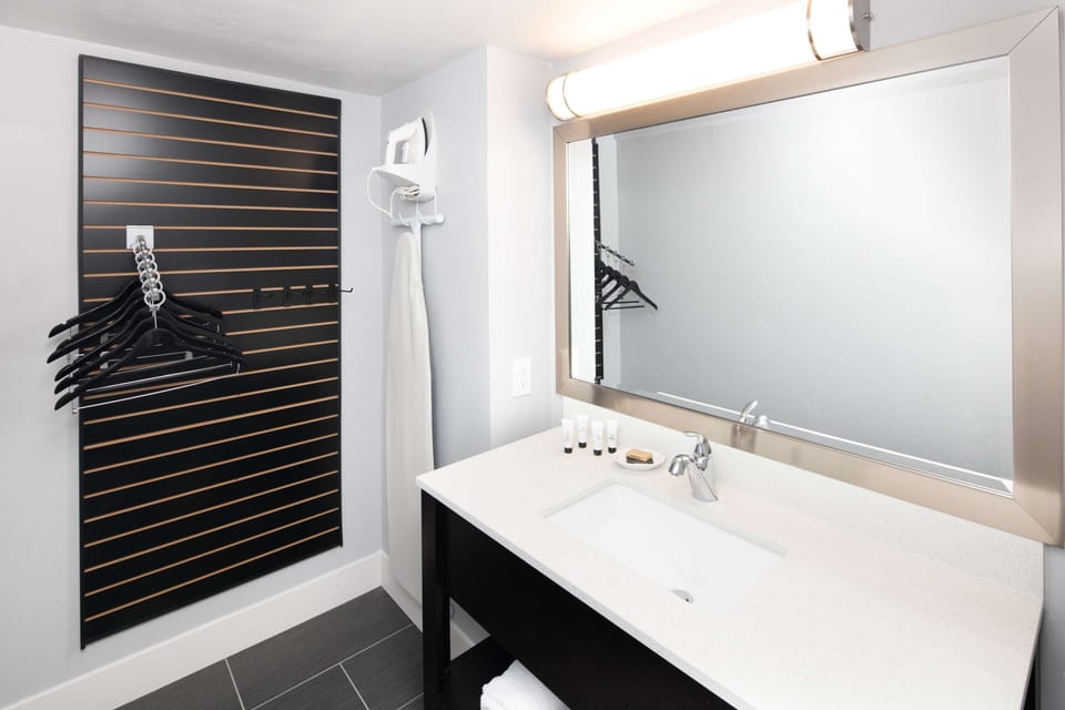 Eco-friendly toiletries, hair dryer, towels