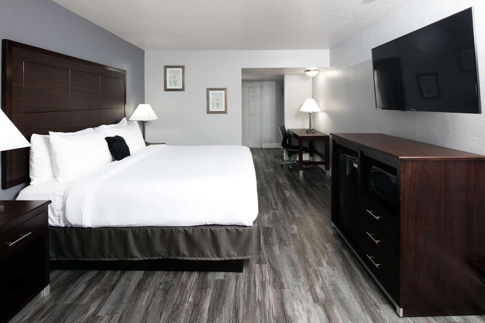 Down comforters, desk, blackout drapes, iron/ironing board