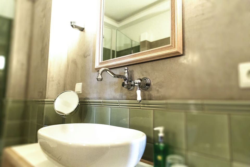 Bathtub, free toiletries, hair dryer, bathrobes