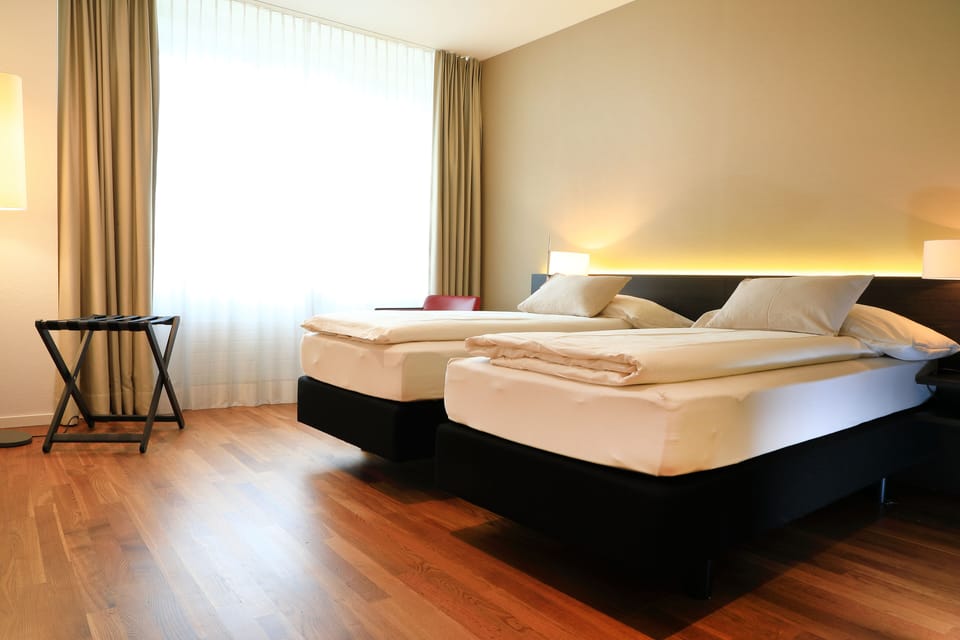 Hypo-allergenic bedding, minibar, in-room safe, desk