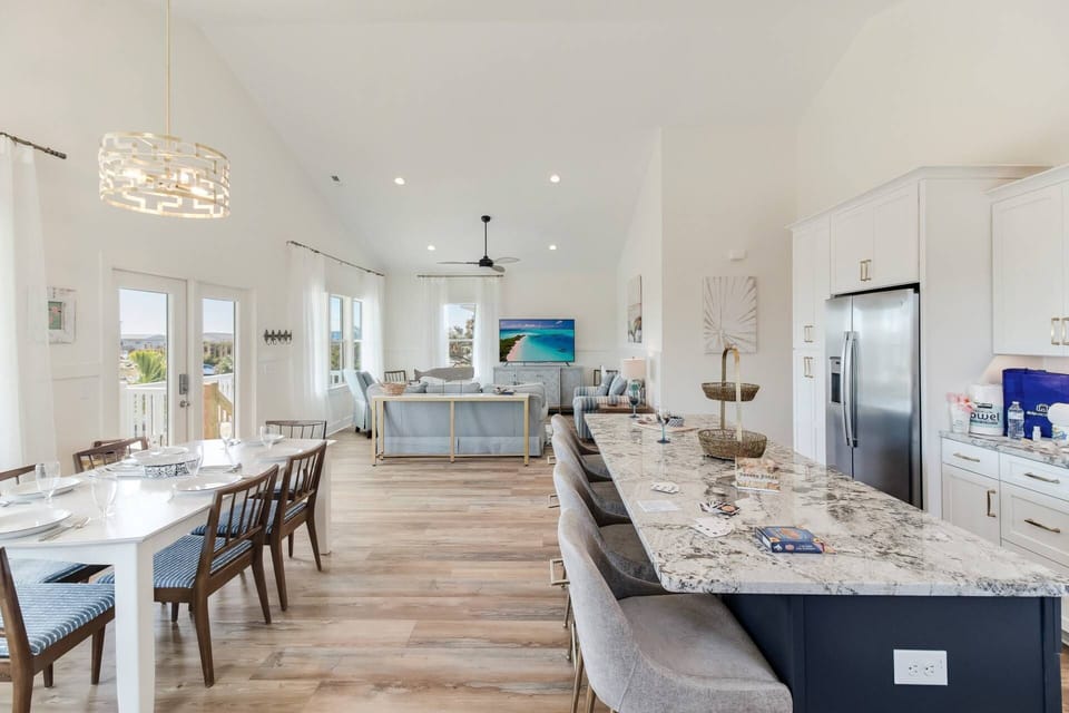 Contemporary open concept living area allows for everyone being together even while engaged in different activities.