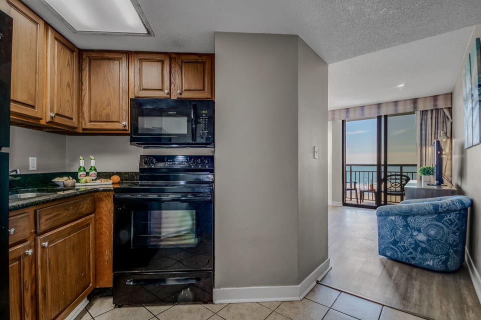 Embrace the convenience of a smartly designed kitchen in our suite, offering efficiency and style with every culinary task at your fingertips.