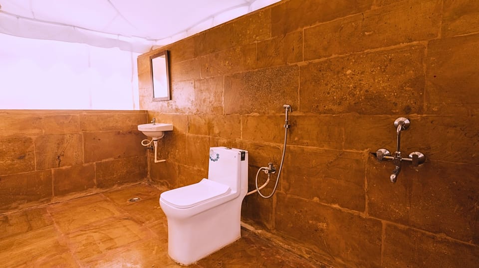 Royal Tent | Bathroom | Rainfall showerhead, free toiletries, towels, soap