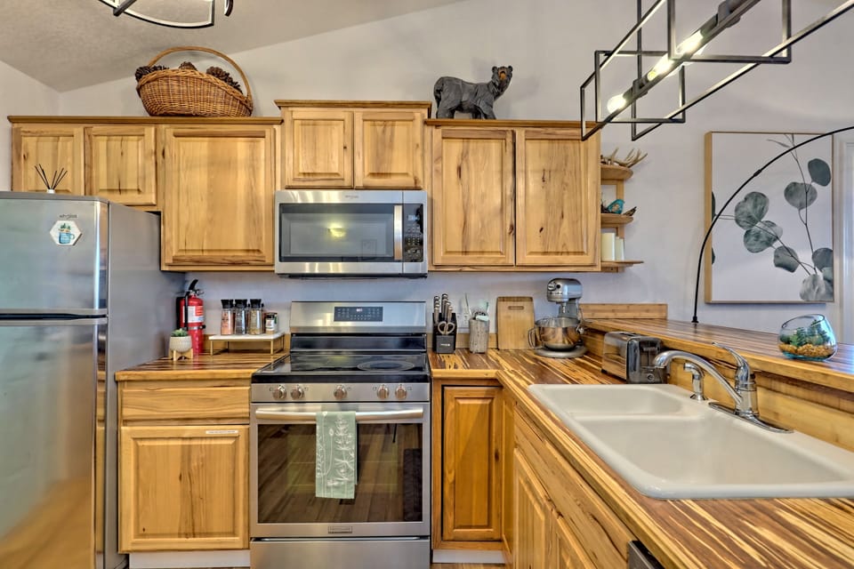 Full Stainless Steel appliances with a rustic charm.