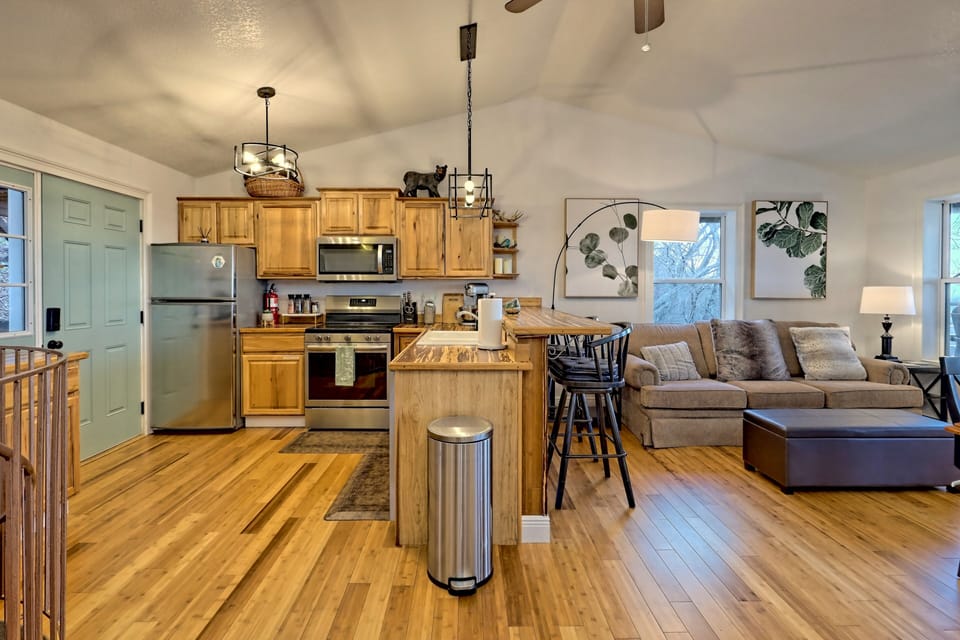 Cook up a meal in the fully stocked kitchen.