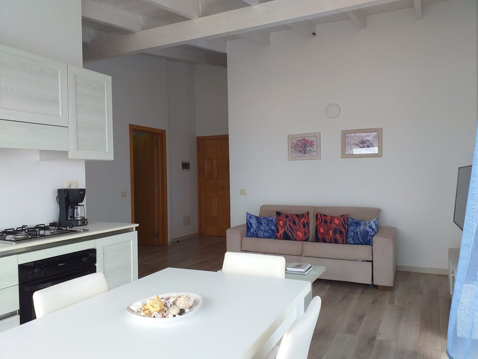 Premium Apartment, 1 Bedroom, Terrace, Sea View | Living area | 45-inch Smart TV with cable channels, TV