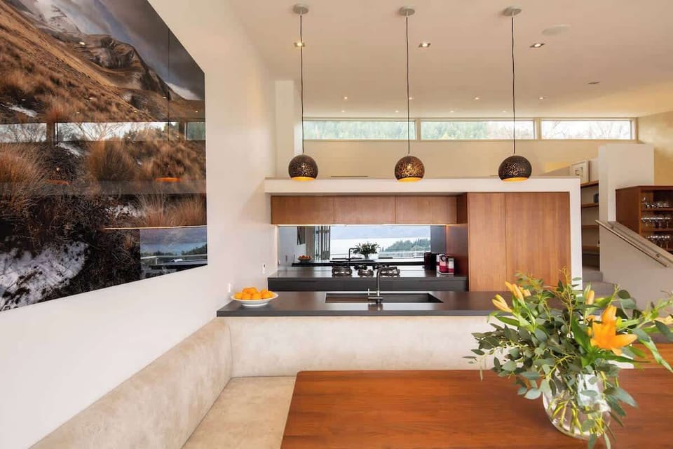 Bright and Scenic: This stylish kitchen combines functionality with beauty, offering panoramic views while you cook or entertain.