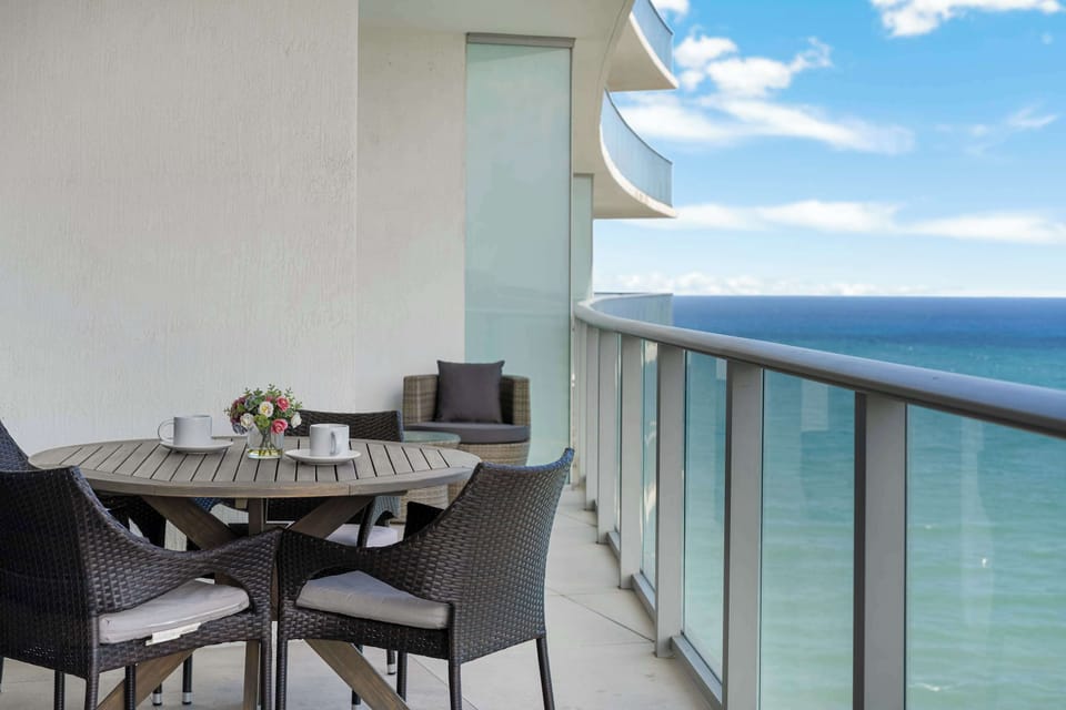 Sleek glass railings ensure that your view of the ocean is never interrupted.