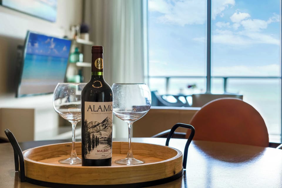 Relax and unwind with a glass of wine as you watch the sunset from the living room.