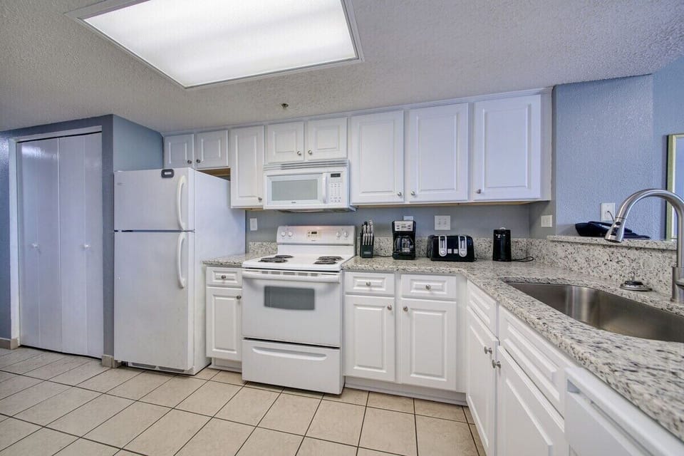Kitchen Stocked with Amenities to Cook in your Home Away from Home