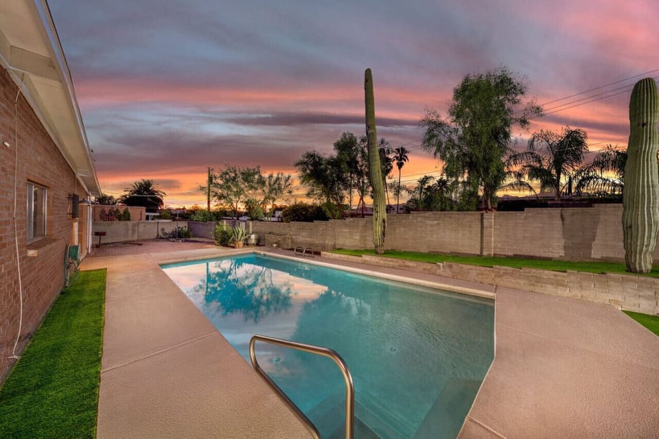 Tucson sunsets over your private, fully fenced pool (unheated), with the grill patio just off to the right