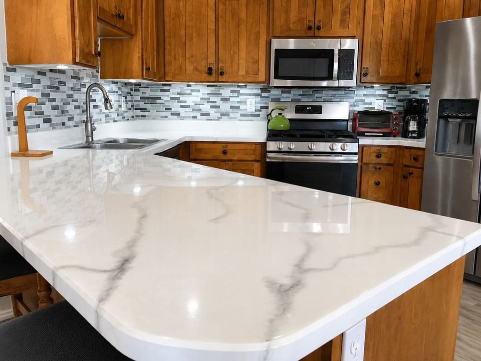 Open-concept kitchen with generous island and full-size appliances