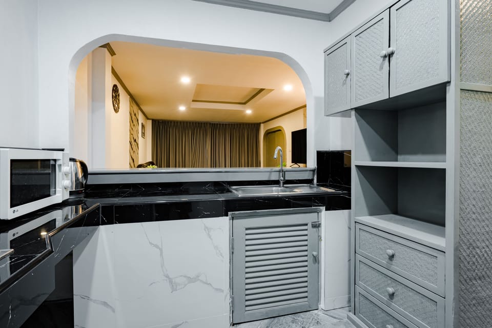 Family Room | Private kitchen | Fridge, electric kettle, paper towels