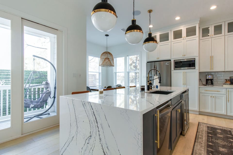 Waterfall Quartz counters, wine fridge