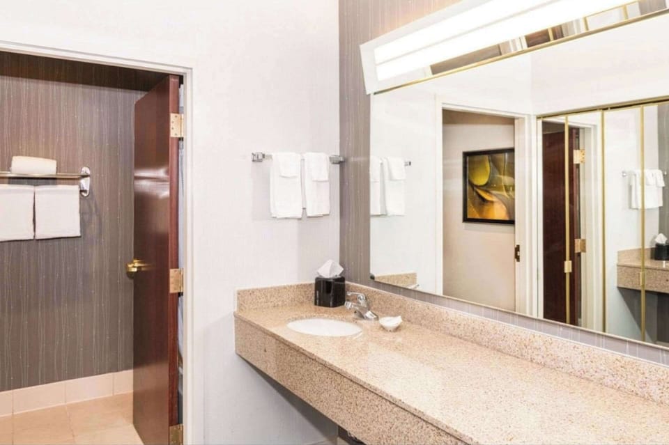 Premium bedding, down comforters, desk, laptop workspace