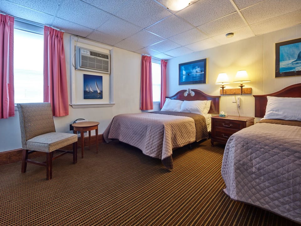 Standard Room, 2 Queen Beds | Iron/ironing board, free WiFi, bed sheets