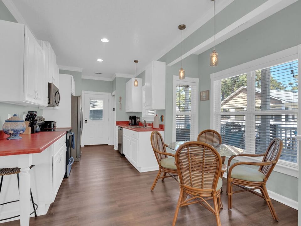 Updated kitchen with stainless steel appliances.