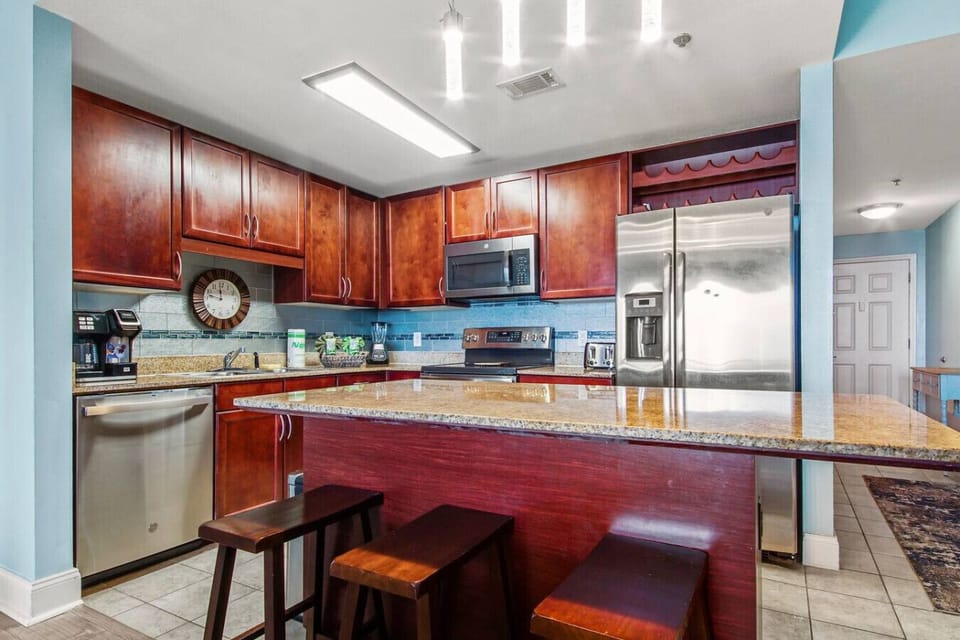 Fully Stocked Kitchen with Ocean Views and Island Bar Seating