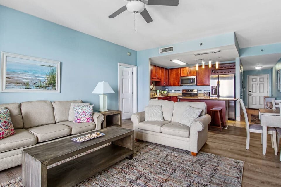 Living Area with Ocean Views, Flat Screen TV, Sleeper Sofa and Private Balcony Access