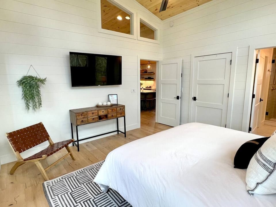 There is closet space and luggage racks for your use during your stay.  The large smart TV is signed in to several streaming services complimentarily.  