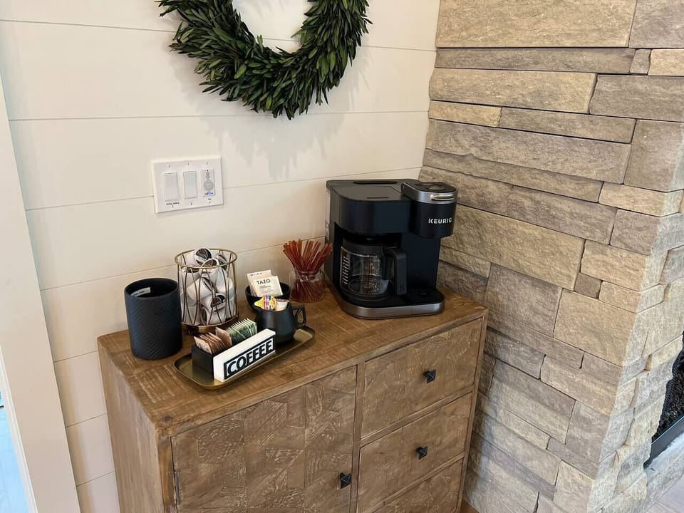 We offer a coffee bar with a Keurig Duo for single pot or single mug coffee.  An initial supply of coffee pods, sweeteners and creamers are provided.  