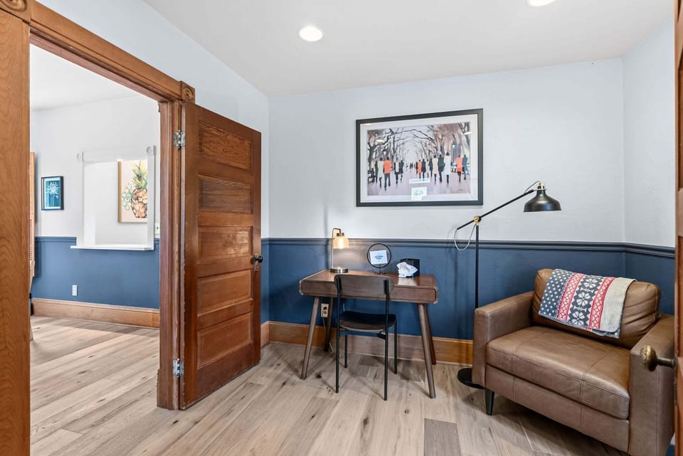 Private office and den located on the main level, offering a quiet workspace for remote work or reading. 📚 🖥️