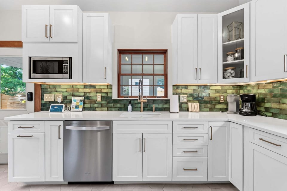 Fully equipped kitchen featuring Keurig, drip coffee maker, and French press, stocked with everything needed to start your day. ☕💛