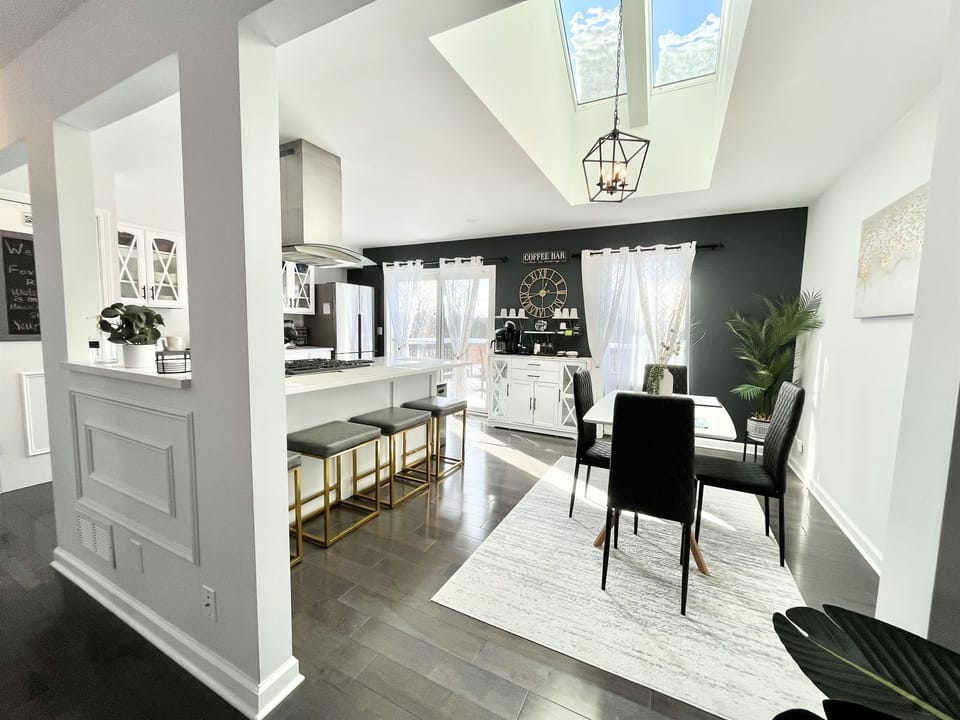 Beautiful open kitchen with dining table