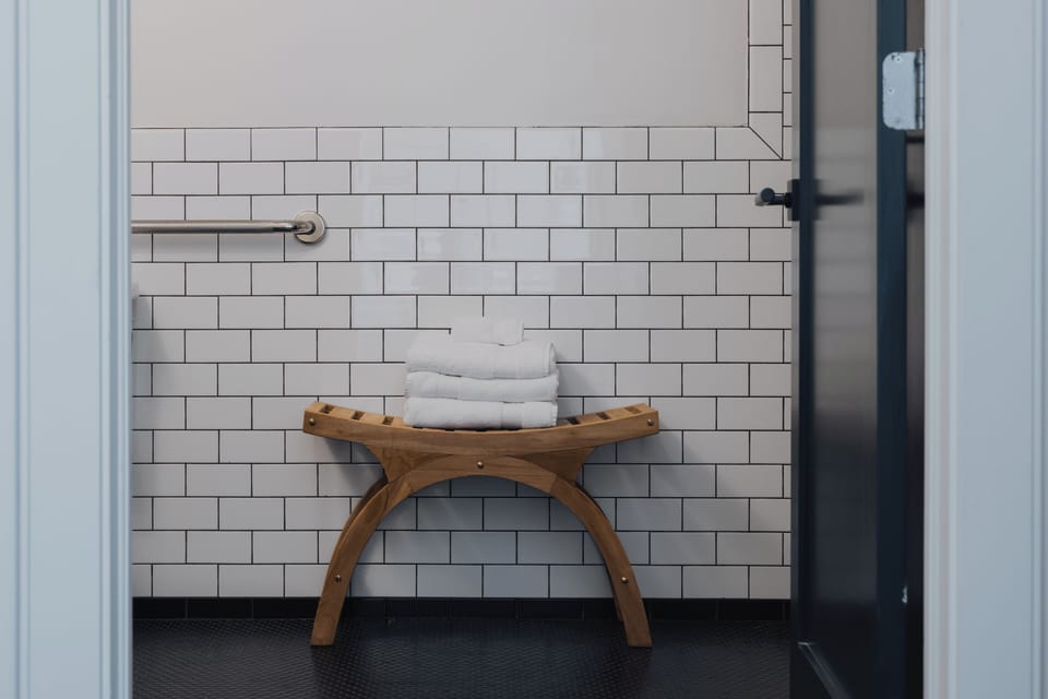 Room, 1 King Bed, Mobility Accessible (Courtyard) | Bathroom | Free toiletries, hair dryer, towels, soap