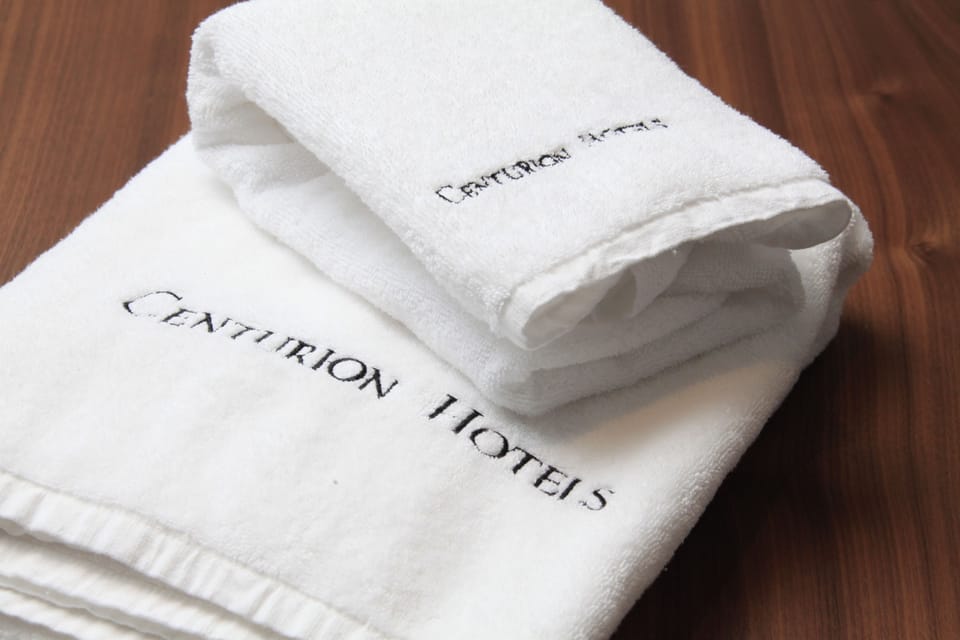 Combined shower/tub, free toiletries, hair dryer, slippers