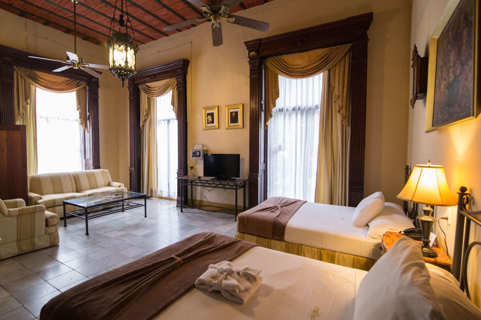 Executive Suite, 2 Double Beds | Premium bedding, in-room safe, iron/ironing board, WiFi (free)
