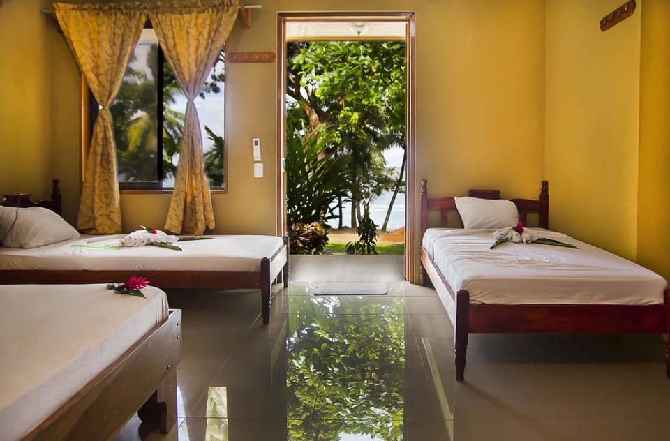 Deluxe Quadruple Room, Ocean View | Bathroom sink