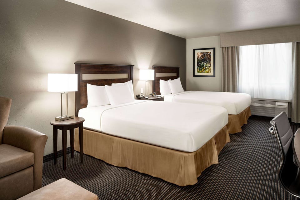 Room, 2 Queen Beds, Non Smoking | Desk, blackout drapes, iron/ironing board, free rollaway beds