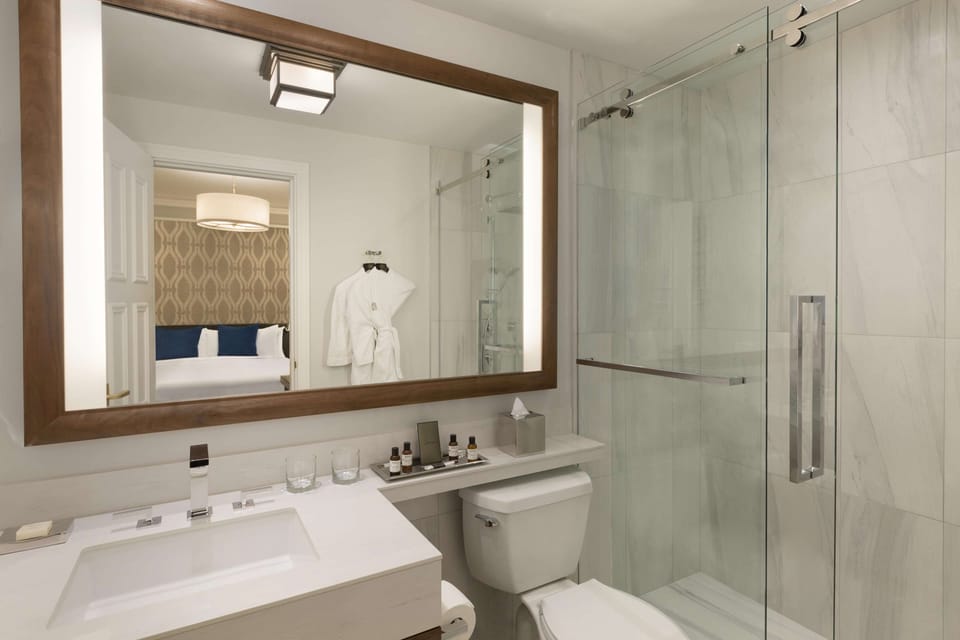 Designer toiletries, hair dryer, bathrobes, slippers