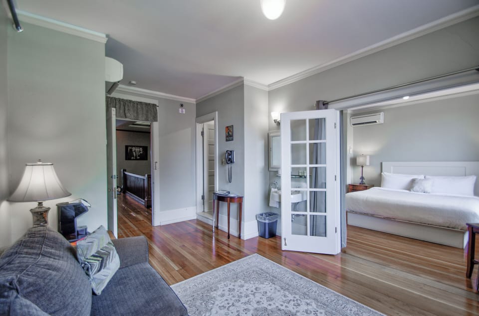 Suite, 1 King Bed with Sofa Bed (W/ Marble Shower) | Premium bedding, individually decorated, individually furnished