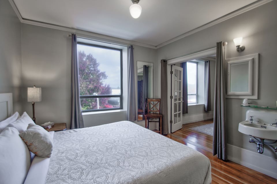 Suite, 1 King Bed with Sofa Bed (W/ Marble Shower) | Premium bedding, individually decorated, individually furnished