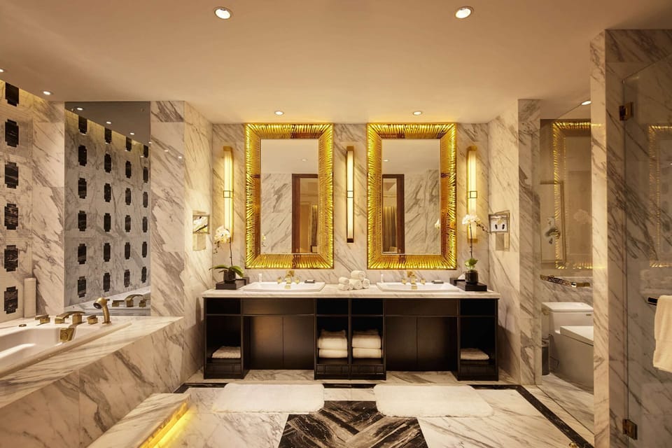 Presidential Room, 1 King Bed | Bathroom | Separate tub and shower, rainfall showerhead, designer toiletries