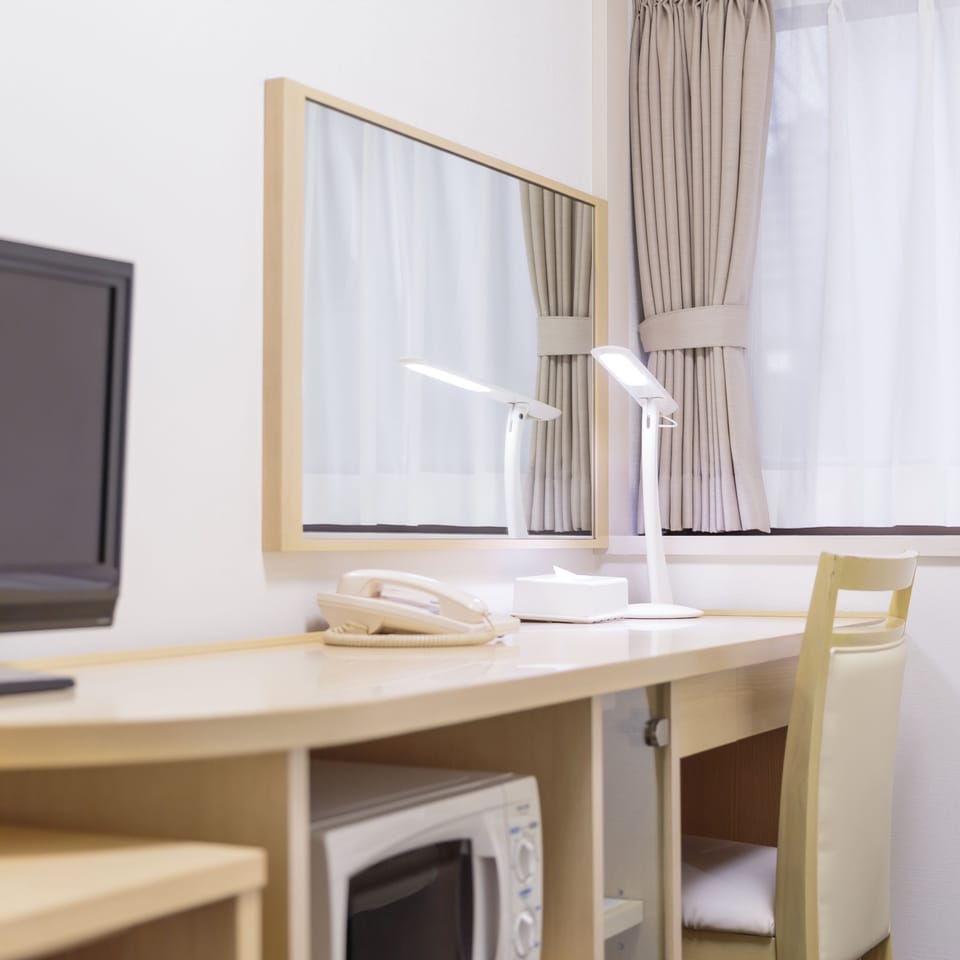 Down comforters, desk, free WiFi, bed sheets