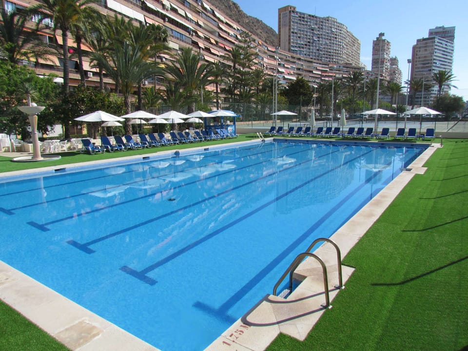 Seasonal outdoor pool, pool umbrellas, sun loungers