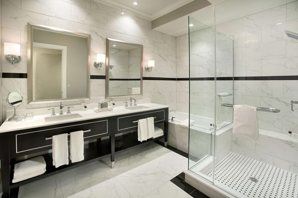 Designer toiletries, hair dryer, bathrobes, towels