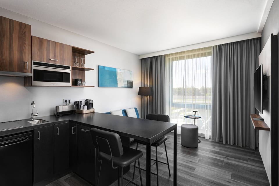 Studio, 1 King Bed | Living area | 42-inch TV with digital channels, Netflix, streaming services