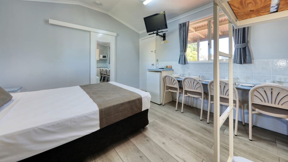 Blackout drapes, iron/ironing board, WiFi (free), bed sheets