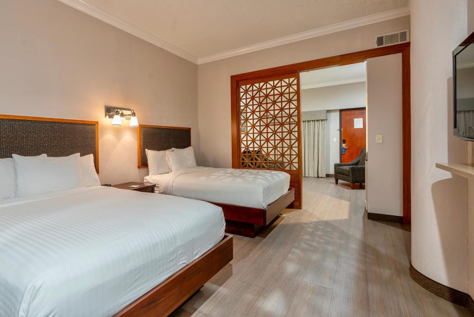 Suite, 2 Double Beds, Non Smoking | Pillowtop beds, in-room safe, desk, laptop workspace