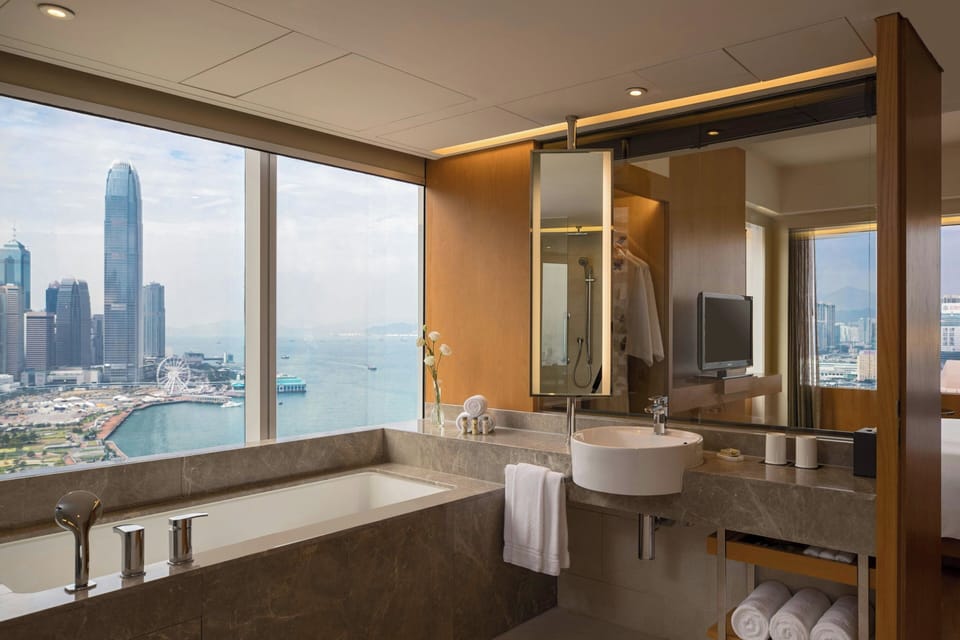 Designer toiletries, hair dryer, bathrobes, slippers