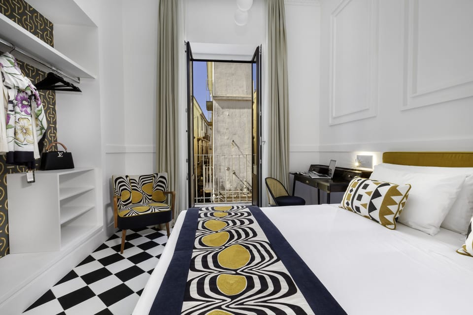 Suite, Balcony, City View | Individually decorated, individually furnished, desk, soundproofing