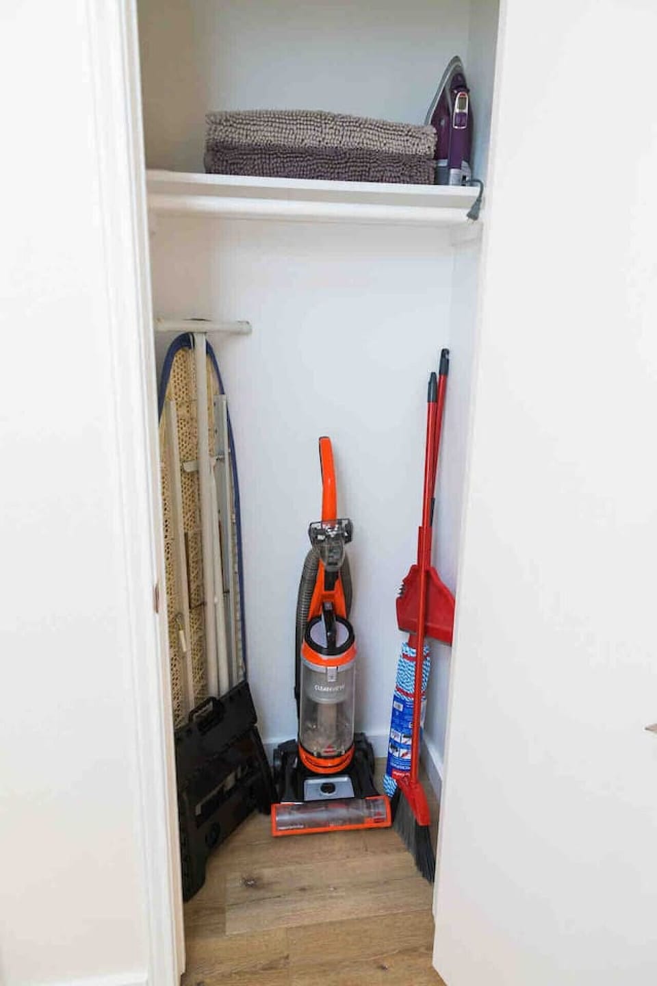 An iron, ironing board, and cleaning supplies are also provided and are located in the hall closet next to the second bathroom.