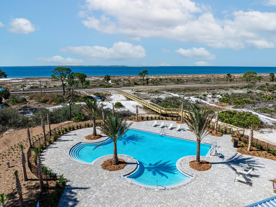 Pool -1 min drive from our home. Boardwalk goes all the way to the beach!